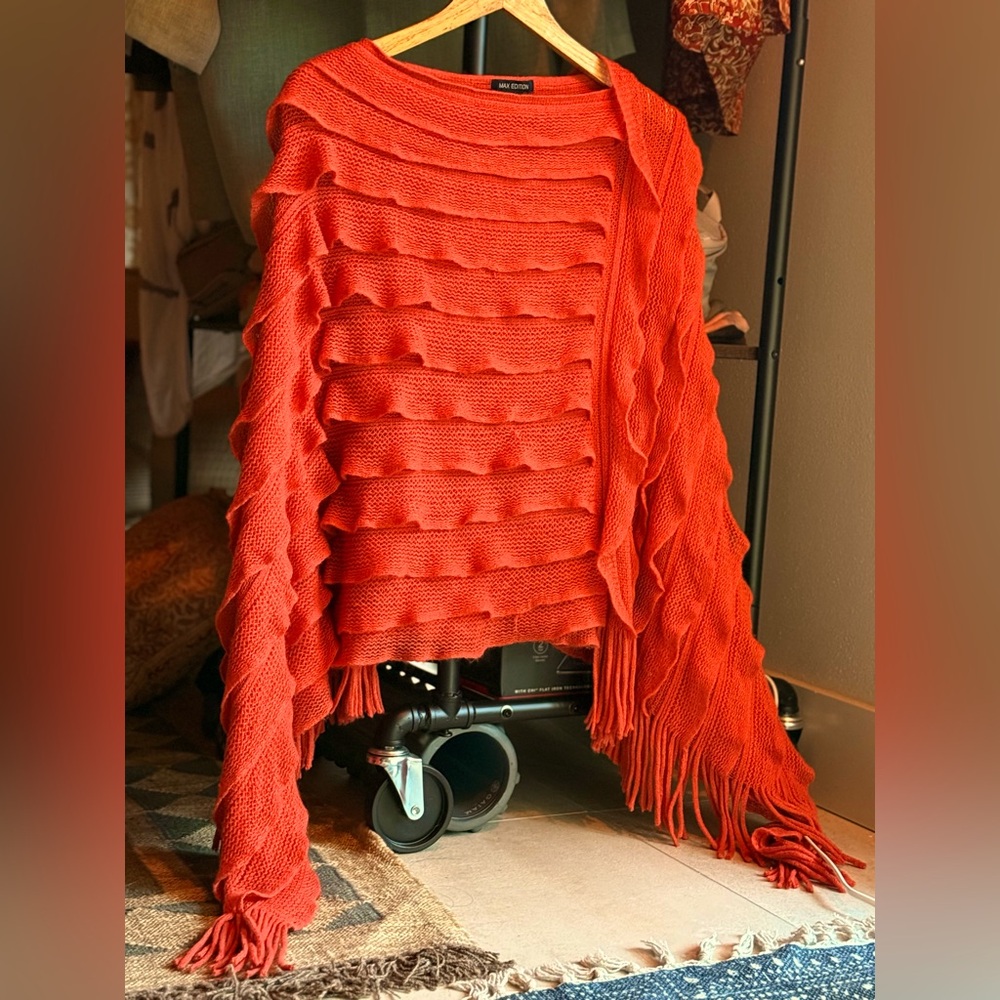 Orange Poncho, One Size. 
Never used.